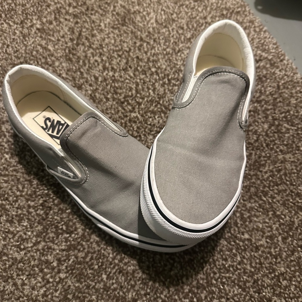 Vans slip ons. Women’s size 9.5. Light gray.